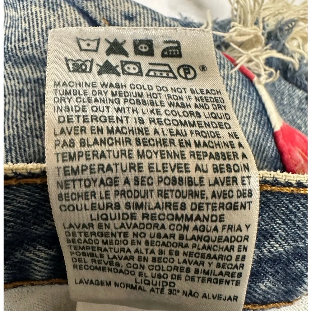 Levi's Distressed Denim Cutoff Shorts with American Flag Pocket - Picture 5 of 7